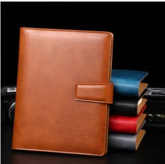 A5 leather notebook with 6-hole binder clip closure and hard cover