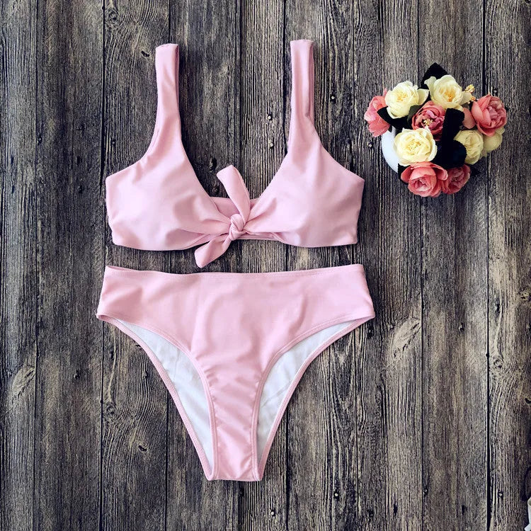 European style solid colour bikini set with bra and panties on white background