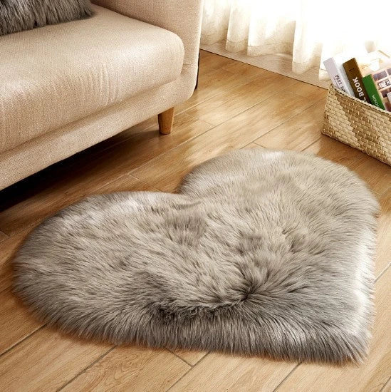 Soft and plush heart-shaped rug in various colors, perfect for cozy home decor