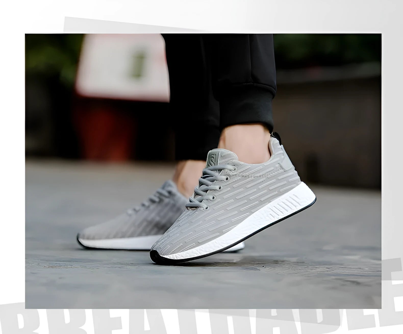 Men Malcolm Sneaker in black from side view showing mesh fabric upper and low-top design