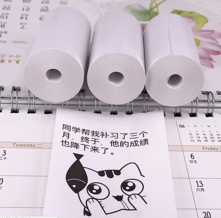 PerPage Mini wireless portable thermal printer paper rolls in regular, sticker and label styles, multiple colours