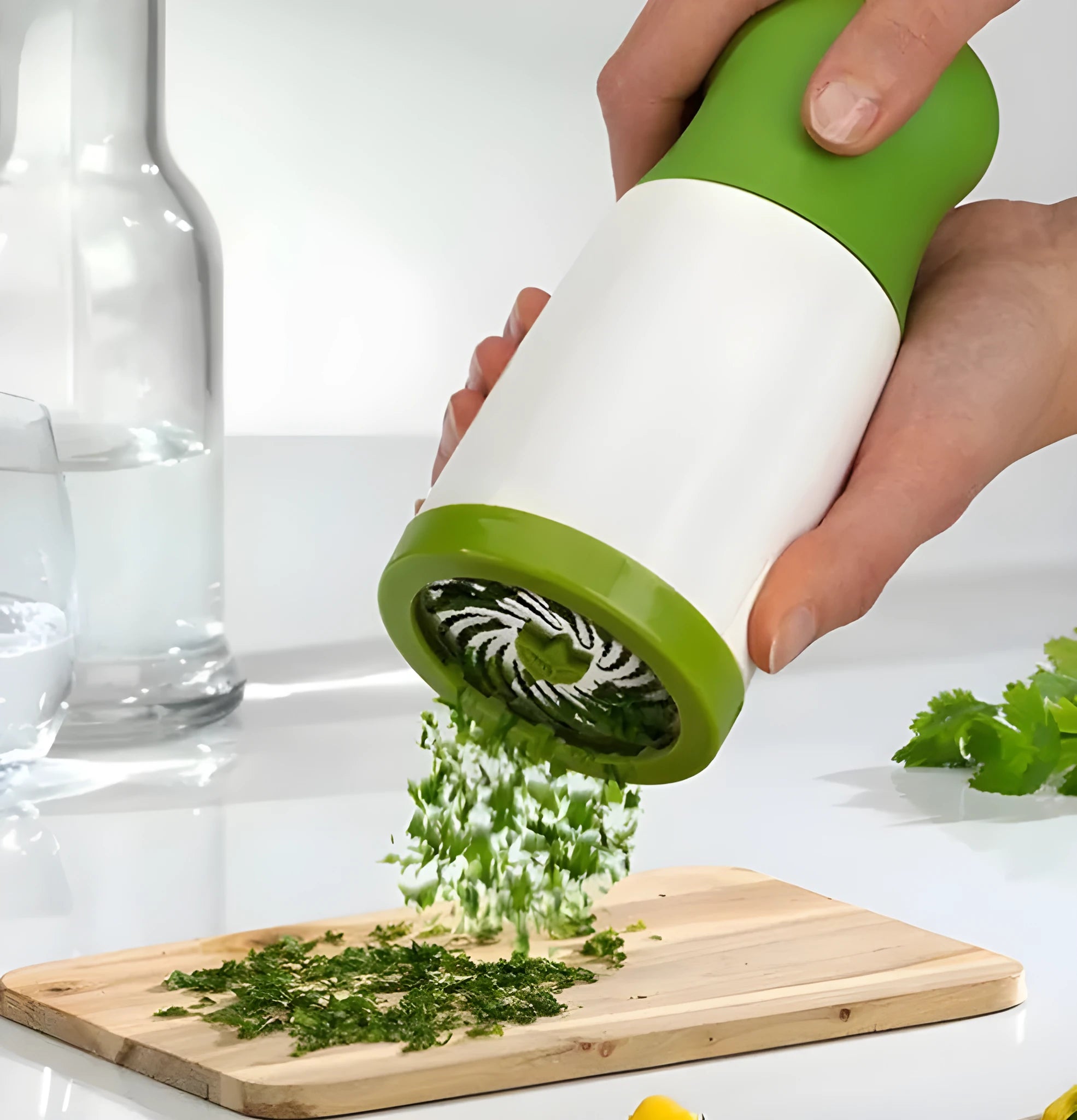 Hand-held herb grinder and spice mill with microplane cutting blade for chopping fresh herbs
