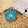 3-inch carbon steel tongue drum with six tone tongues, available in multiple colours