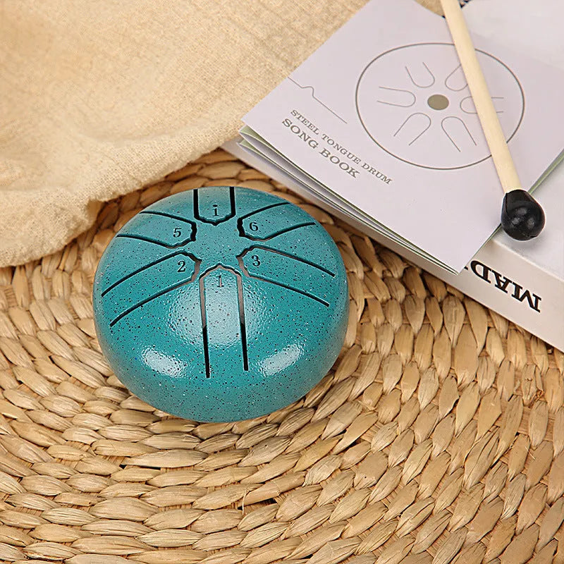 3-inch carbon steel tongue drum with six tone tongues, available in multiple colours