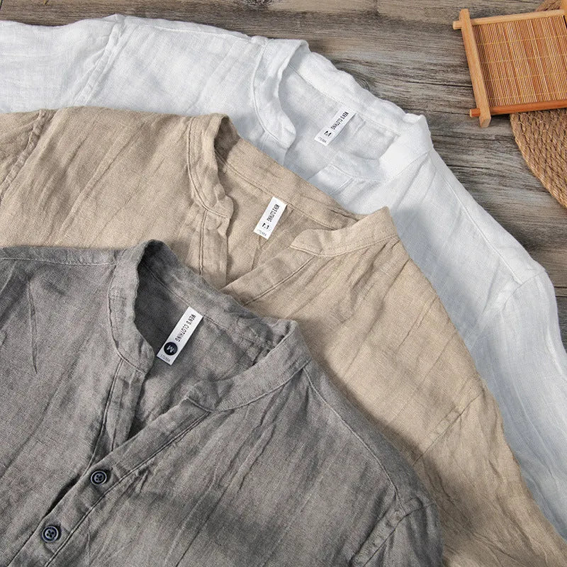 Women's grey linen short sleeve pullover top on a hanger