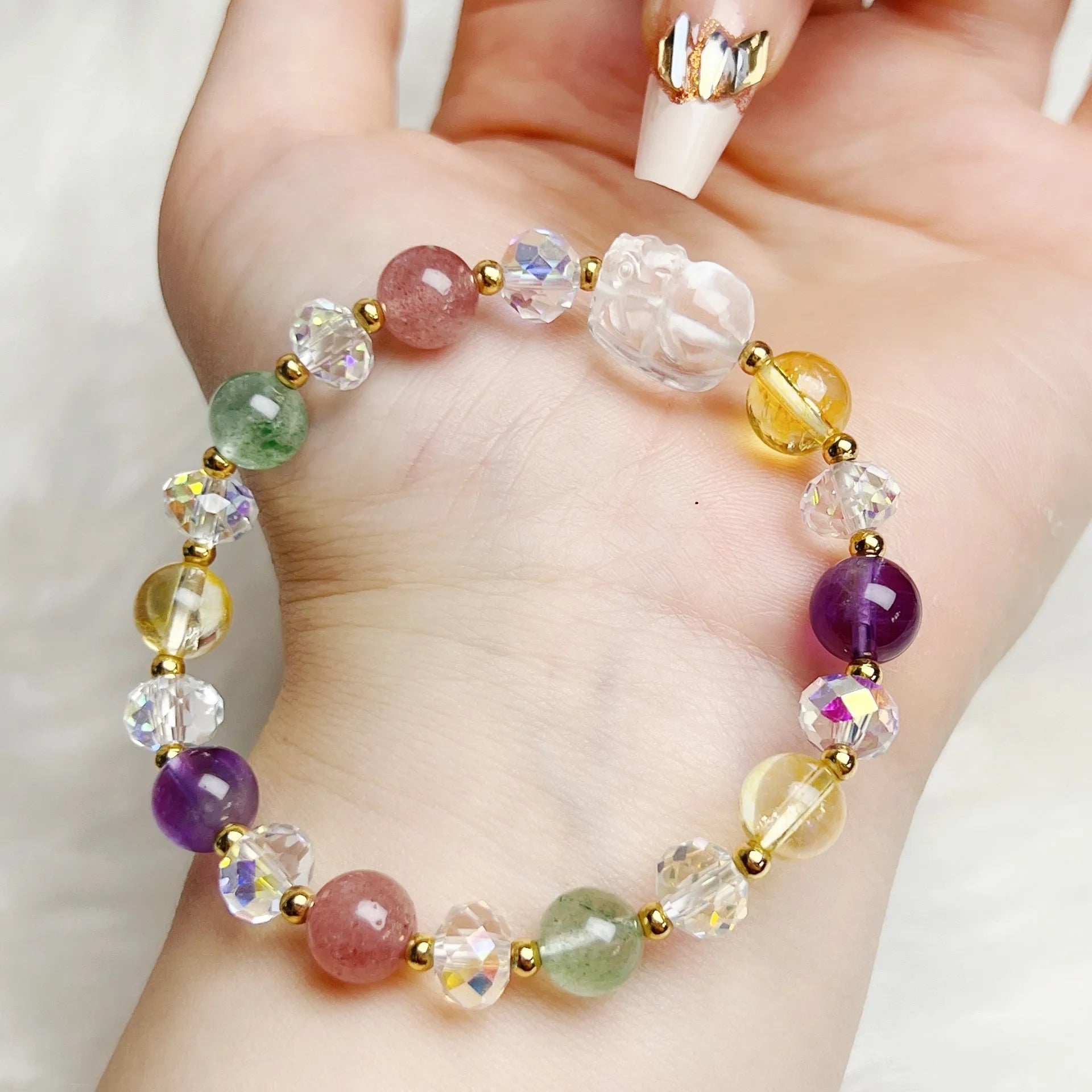 A women's crystal bracelet with a handcrafted nine-tail fox animal design.