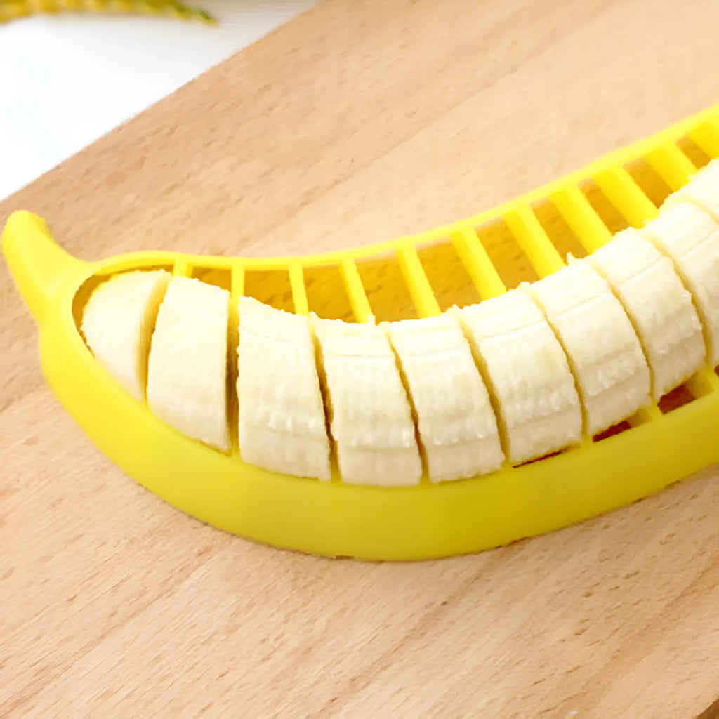 Yellow banana cutter slicer made of food-grade PP, approximately 25 x 7 x 1.4 cm