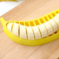 Yellow banana cutter slicer made of food-grade PP, approximately 25 x 7 x 1.4 cm