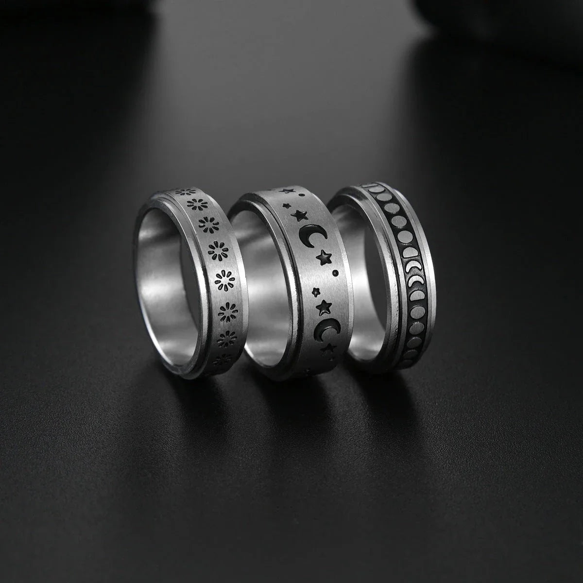 Dazzling titanium steel rings featuring celestial motifs like stars, moons, and more for a captivating and stylish accessory