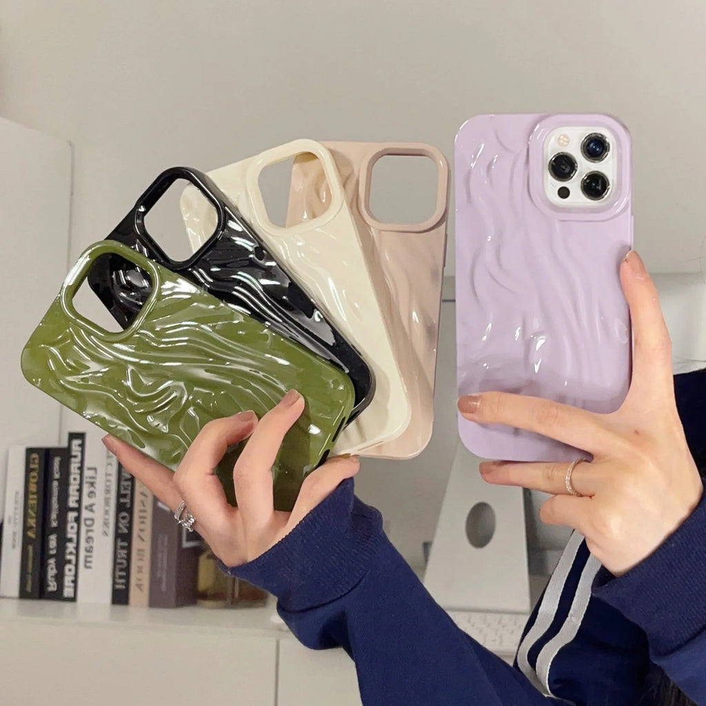 High-grade silicone iPhone case with a water ripple texture in beige white colour on a table.