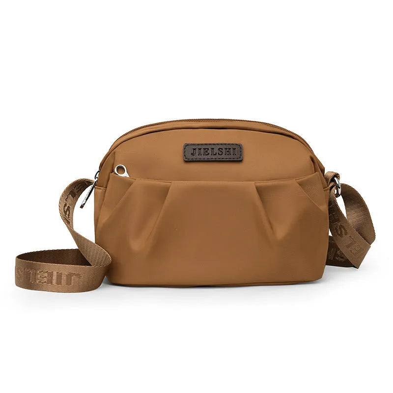 Pleated oxford cloth messenger phone bag with zip compartments in ten colour options
