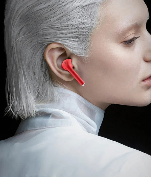 Stylish Bluetooth earbuds with lipstick-inspired design, noise-cancellation, and hands-free calling capabilities