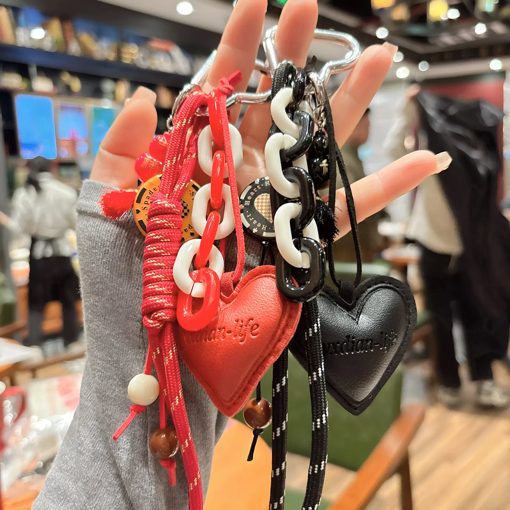 Leather keychain with heart-shaped small gourd pendant in brown, woven rope strap