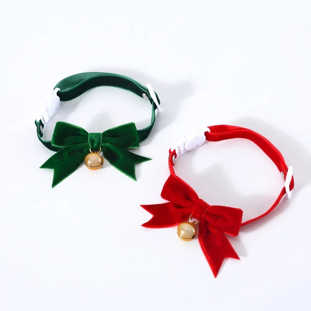 Pet velvet bow tie collar with anti-suffocation buckle in red velvet bow on small cat, S size