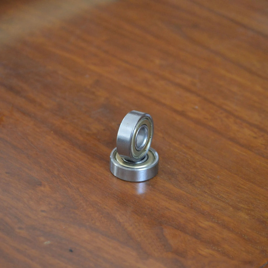 6000ZZ model carbon steel deep groove ball bearing with dimensions 10mm by 26mm by 8mm.