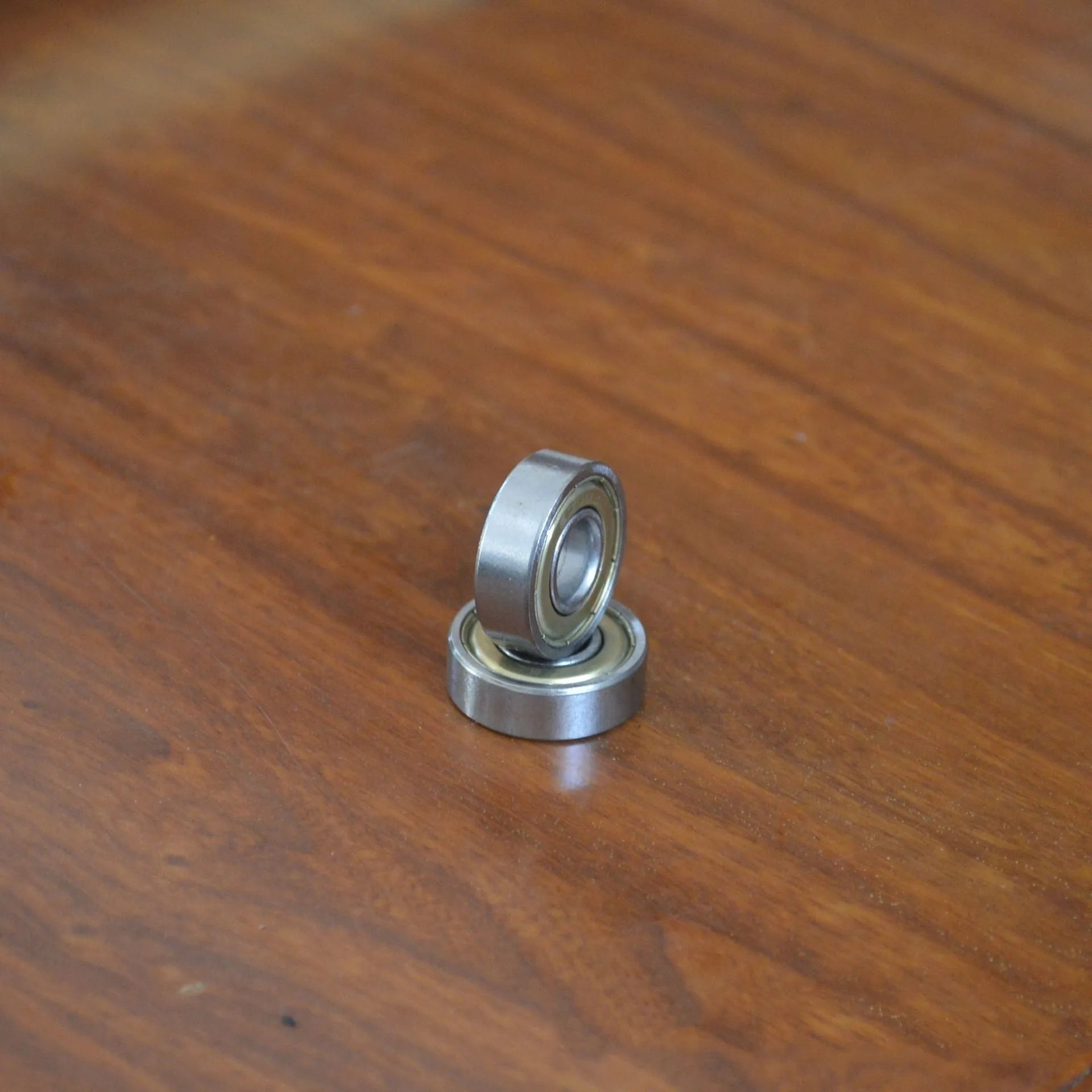 6000ZZ model carbon steel deep groove ball bearing with dimensions 10mm by 26mm by 8mm.