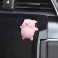 Cute resin cartoon pig figurine designed as a car dashboard decoration accessory.