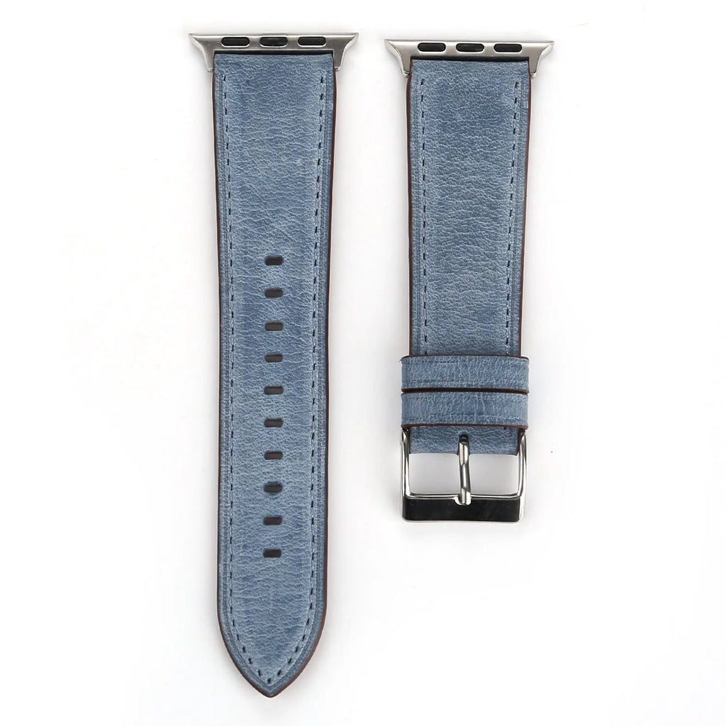 Coloured leather watch strap with a folding buckle on a watch case.