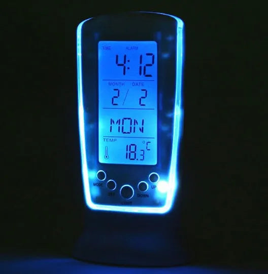 Multi-function LED digital clock with rectangular plastic body, blue backlight, and LCD showing time and temperature