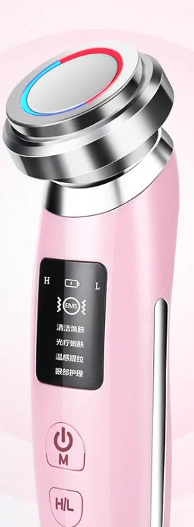 Pink cleansing and rejuvenating beauty instrument measuring 185mm long