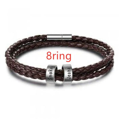 Personalized leather bracelet with engraved name charm for men, featuring a braided design and stainless steel beads