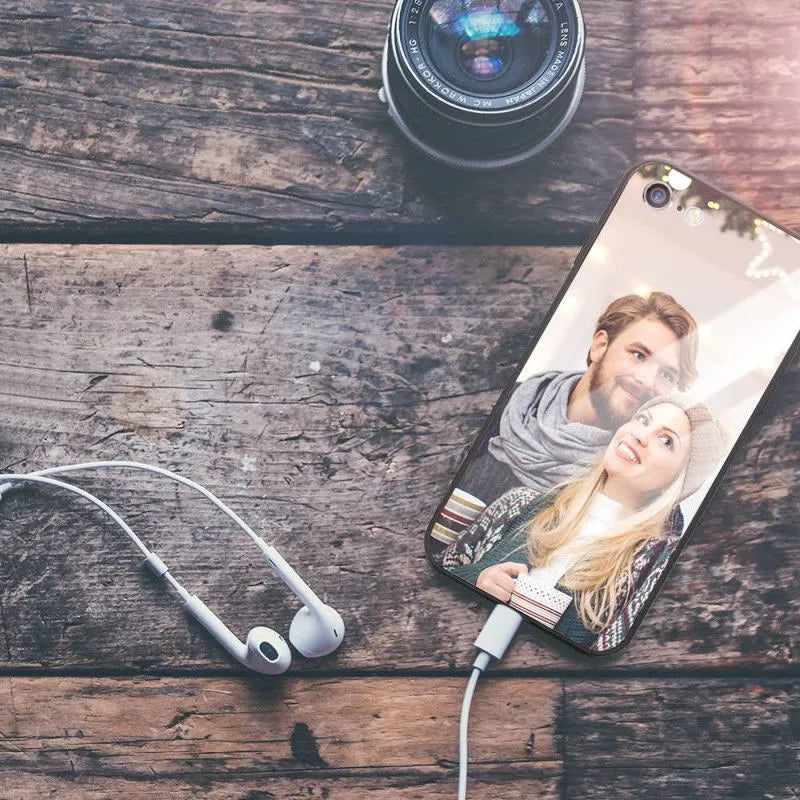 Patterned ultra-thin iPhone case with raised edges protecting the screen and camera lens.