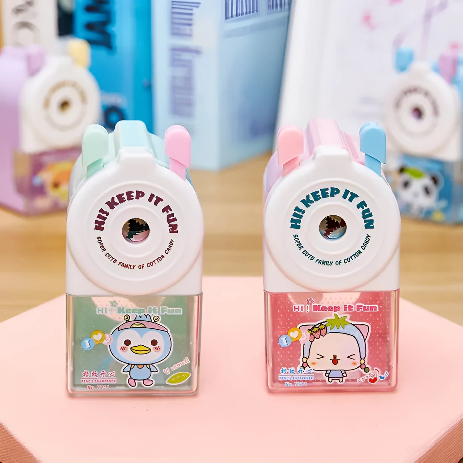 Cartoon geometric pet pencil sharpener in blue, green, pink, or purple colour options
