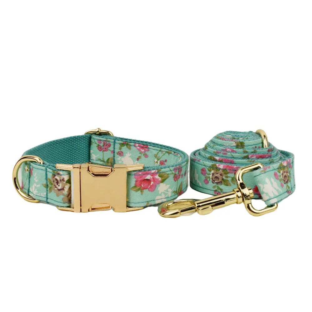 Rose pattern on green background fabric dog collar, leash, bow and vest four-piece pet set