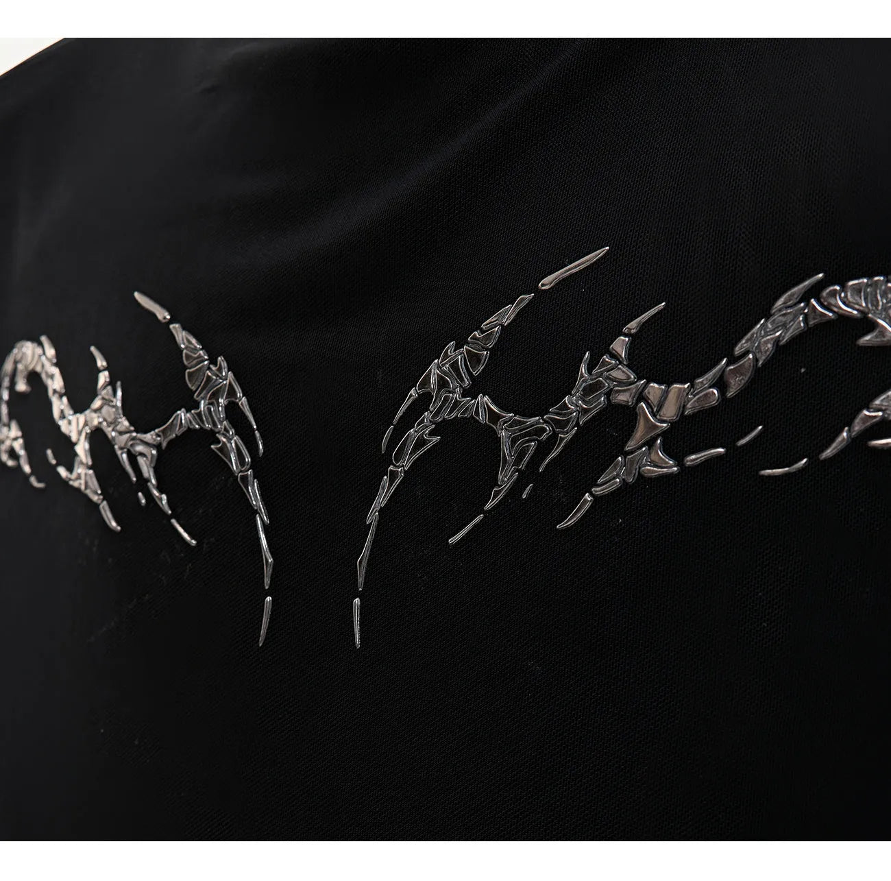 Men's black mesh long-sleeve shirt with a slim, close-fitting bottoming cut on a model.
