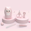 Baby nail clippers set for newborns with silicone finger caps, in colourful animal designs including a blue monkey.