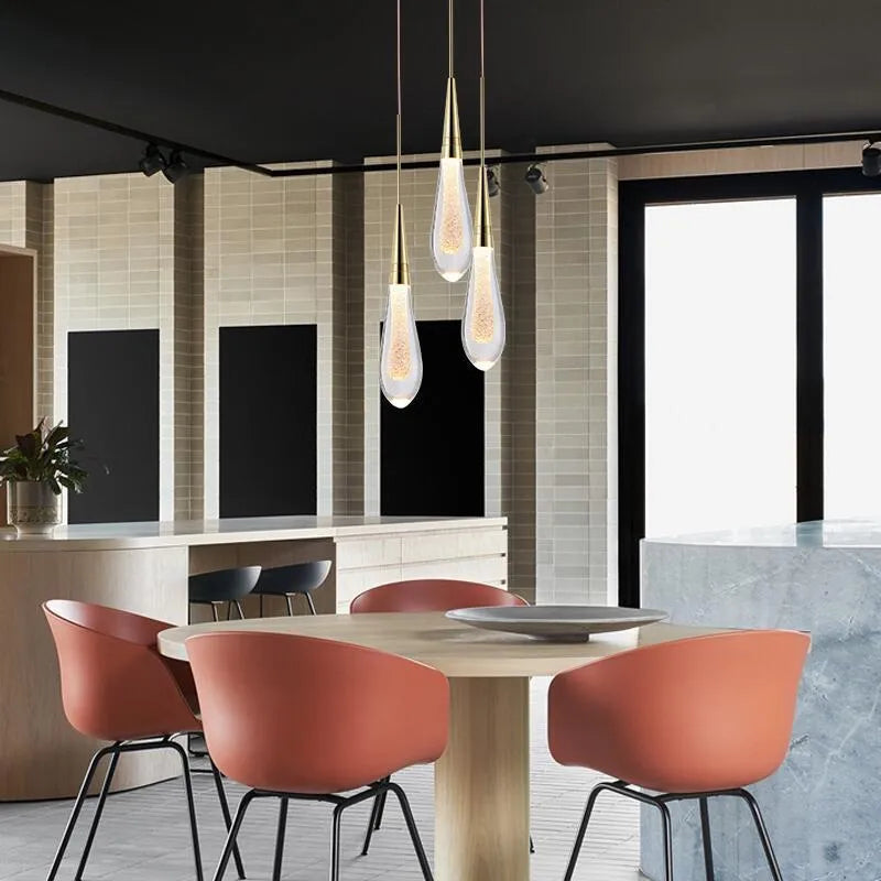 Single head crystal LED chandelier with adjustable cord showing postmodern design and warm white illumination