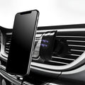 Gloss black car phone holder mounted on vehicle air vent with universal clip mechanism