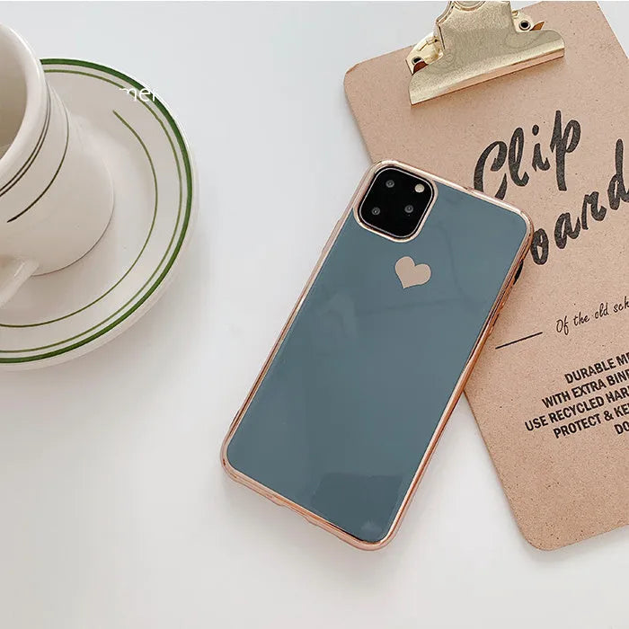 Solid colour TPU back cover phone case for iPhone in blue, claret, pink, or green.