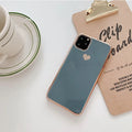 Solid colour TPU back cover phone case for iPhone in blue, claret, pink, or green.