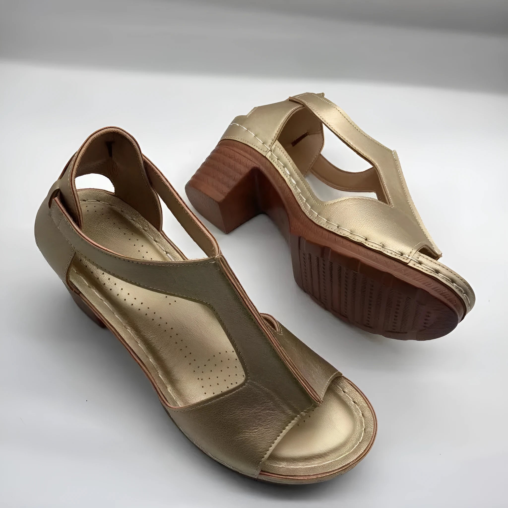Women's beige peep toe wedge sandals with a buckle strap and low heel