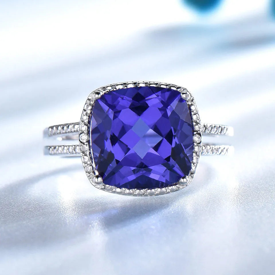 Close-up of a women's sterling silver ring with a genuine blue tanzanite stone.