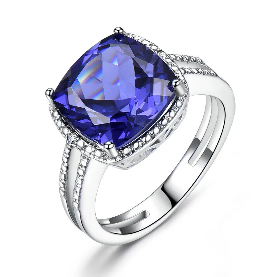 Close-up of a women's sterling silver ring with a genuine blue tanzanite stone.