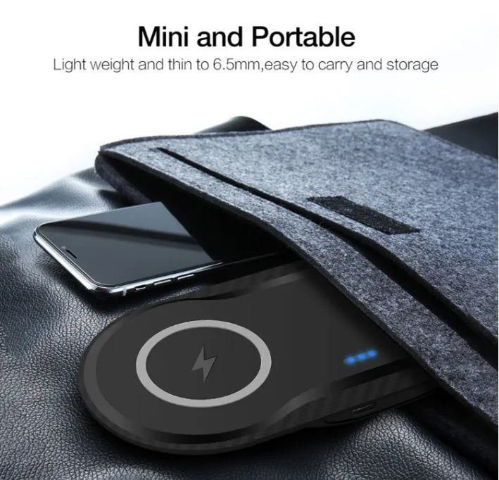 Black and white dual wireless charger charging two smartphones simultaneously on anti-slip silicone base