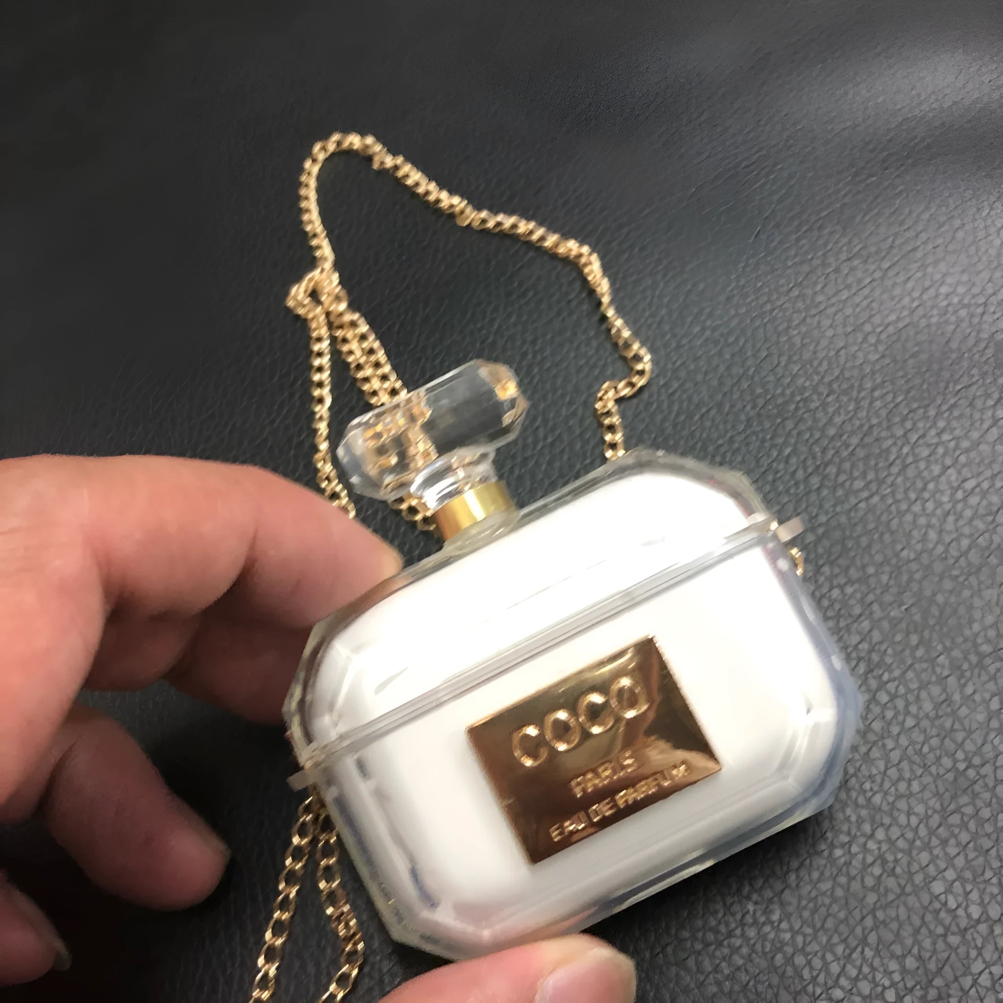 White silicone perfume bottle design case for Apple AirPods Pro and AirPods 2/3 charging box.