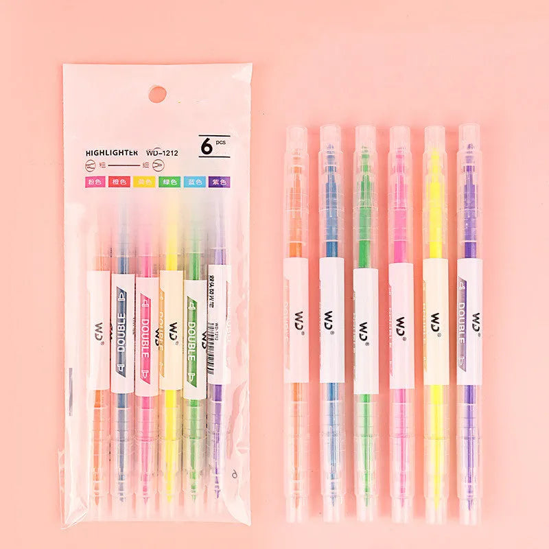 Set of six double-headed marker pens showing round and oblique tips, in assorted colours.