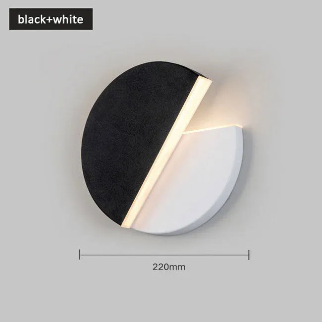 Rotating round LED wall light in black and white wrought iron and acrylic 10W warm white