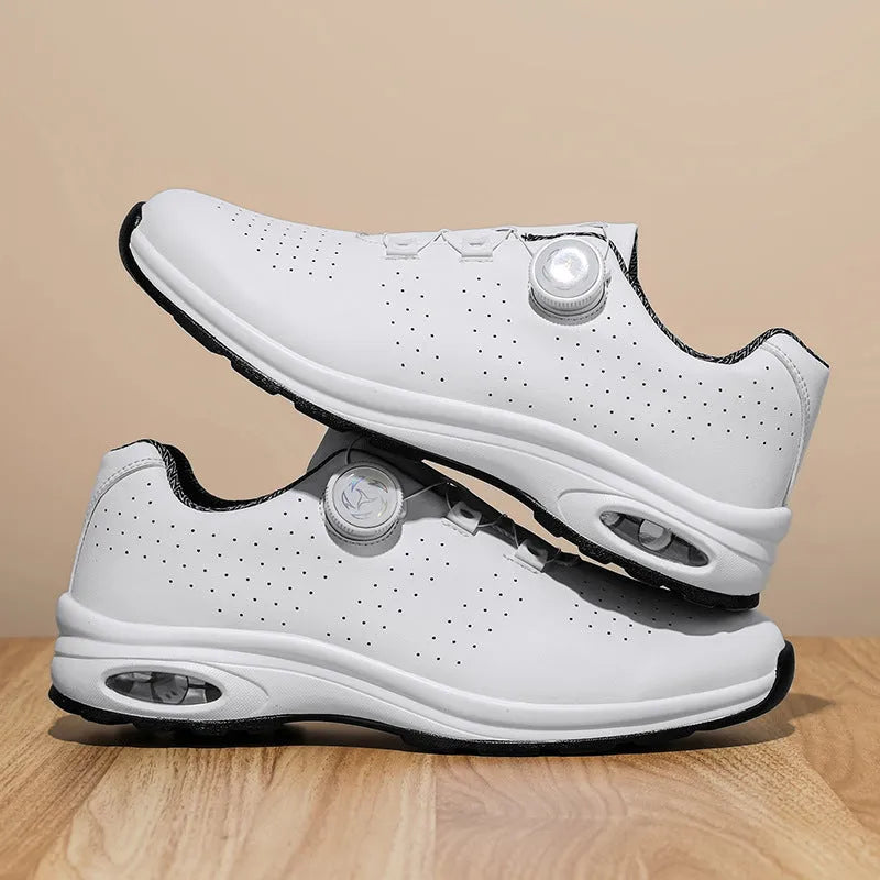 Men's black and white low-top casual tennis shoes with mesh upper and cross shoulder straps