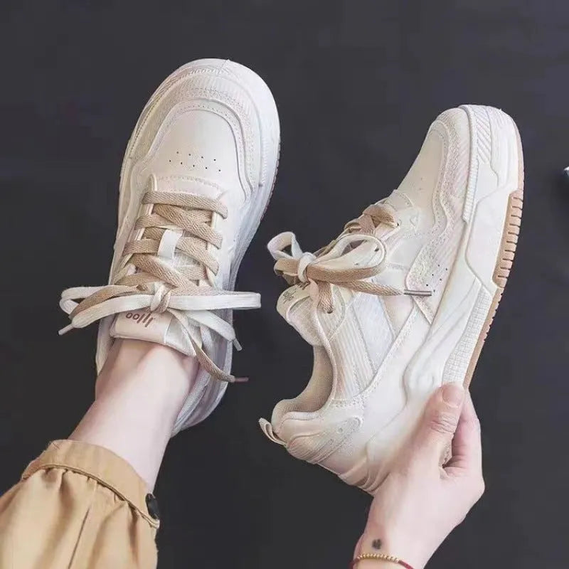 Women's pink spring sneakers with low top design and rubber sole