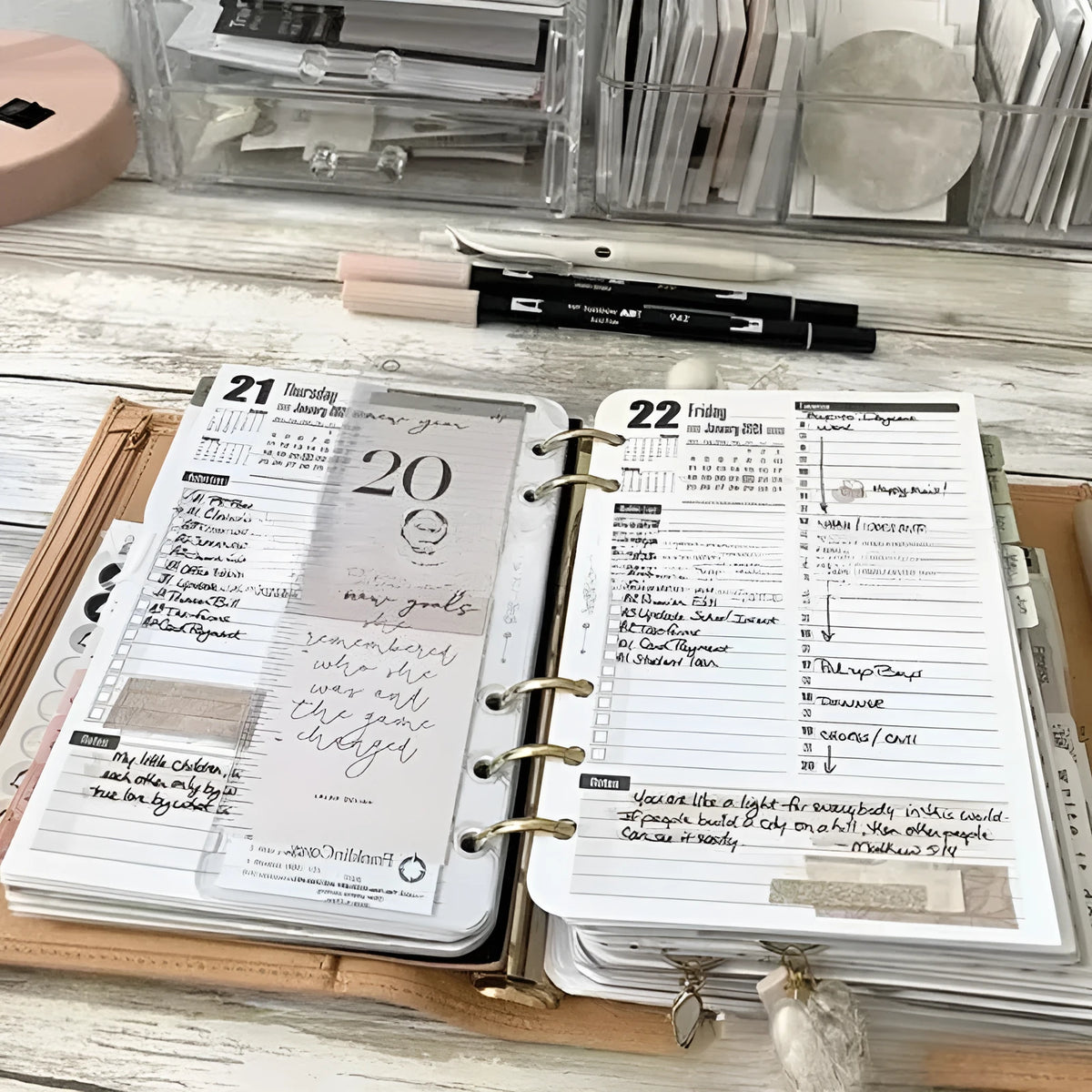 Weekly planner notebook with black or brown cover and coated paper pages in European style