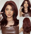 Mid-length curly synthetic wig with long bangs in a platinum gradient colour