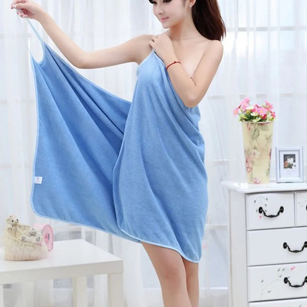 Polyester beach towel dress in pink, shown as a towel and worn as a cover-up.