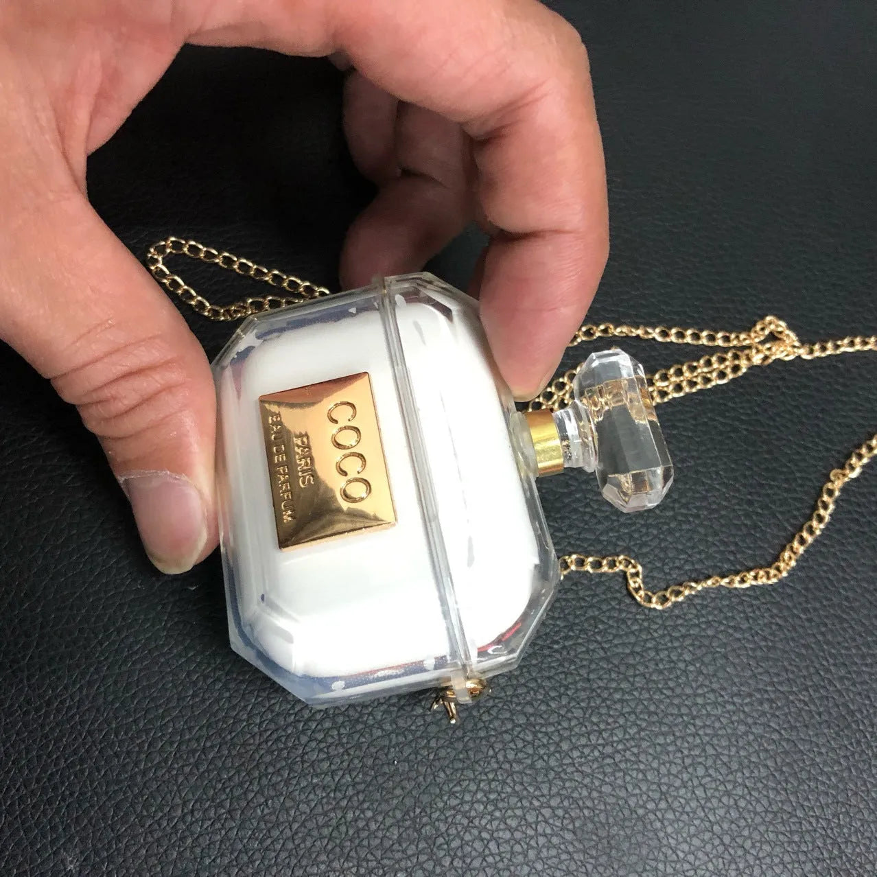 White silicone perfume bottle design case for Apple AirPods Pro and AirPods 2/3 charging box.