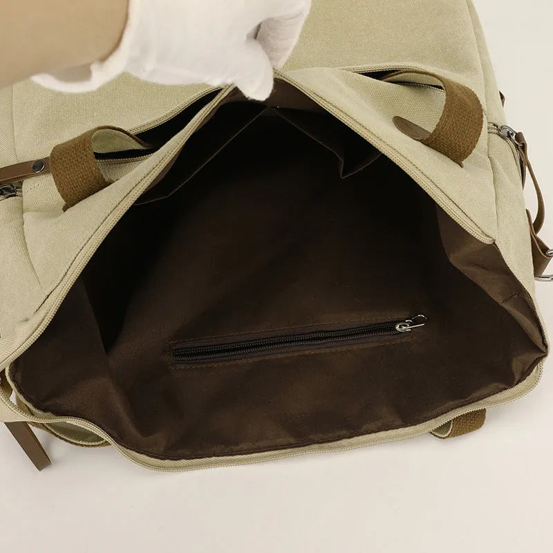 Women's retro style canvas shoulder bag with internal organiser pockets in horizontal square shape