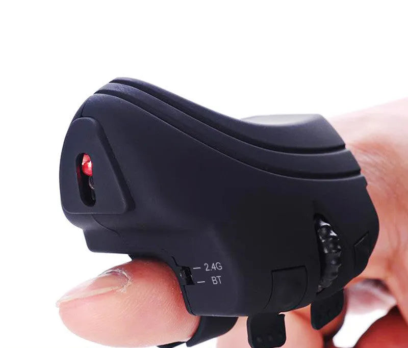Rechargeable Bluetooth 2.4G wireless ring mouse on a finger, black colour, compact size 60x40mm