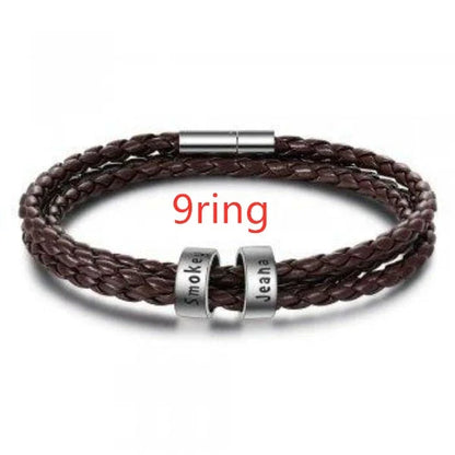 Personalized leather bracelet with engraved name charm for men, featuring a braided design and stainless steel beads